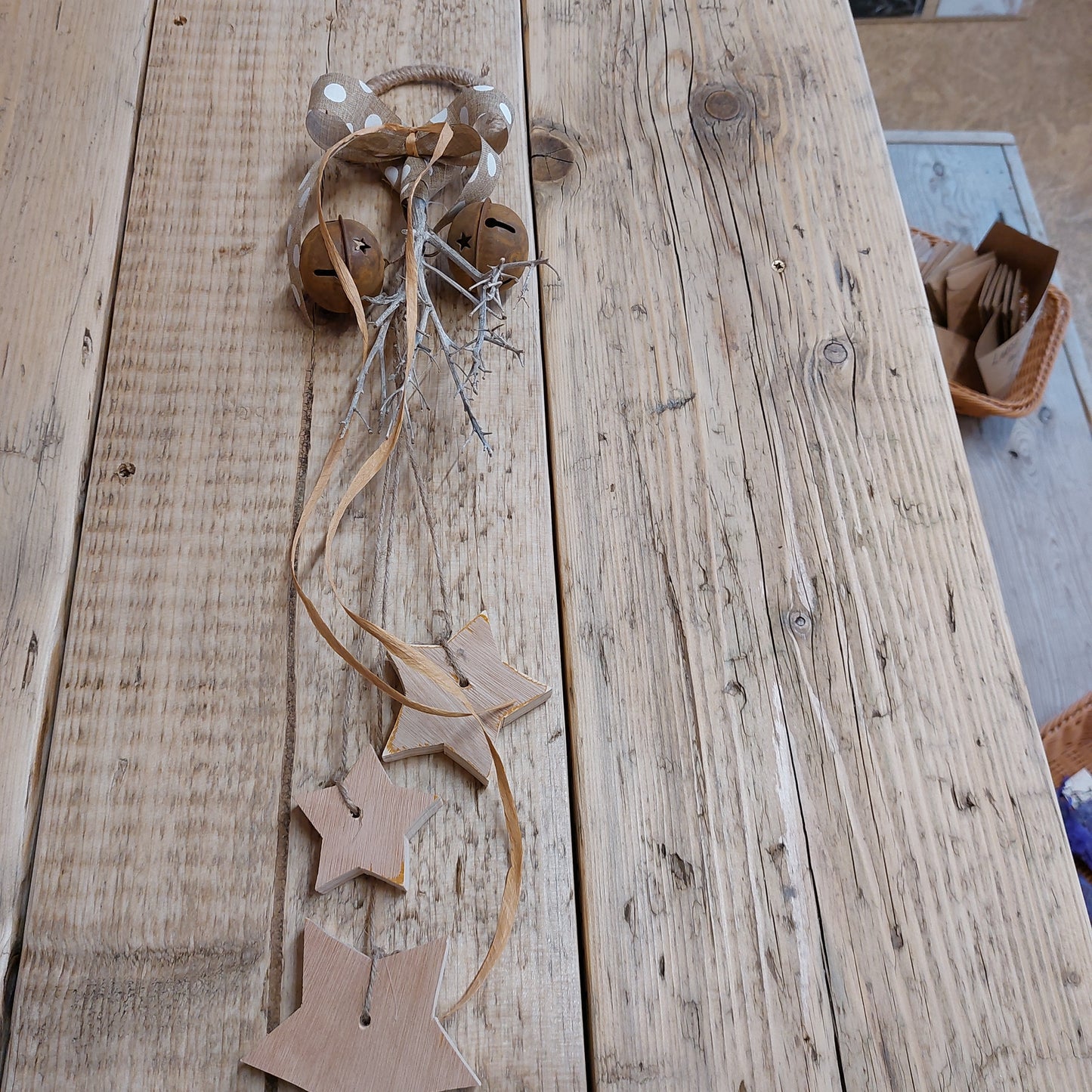 Handmade rustic door hanger with stars and bells