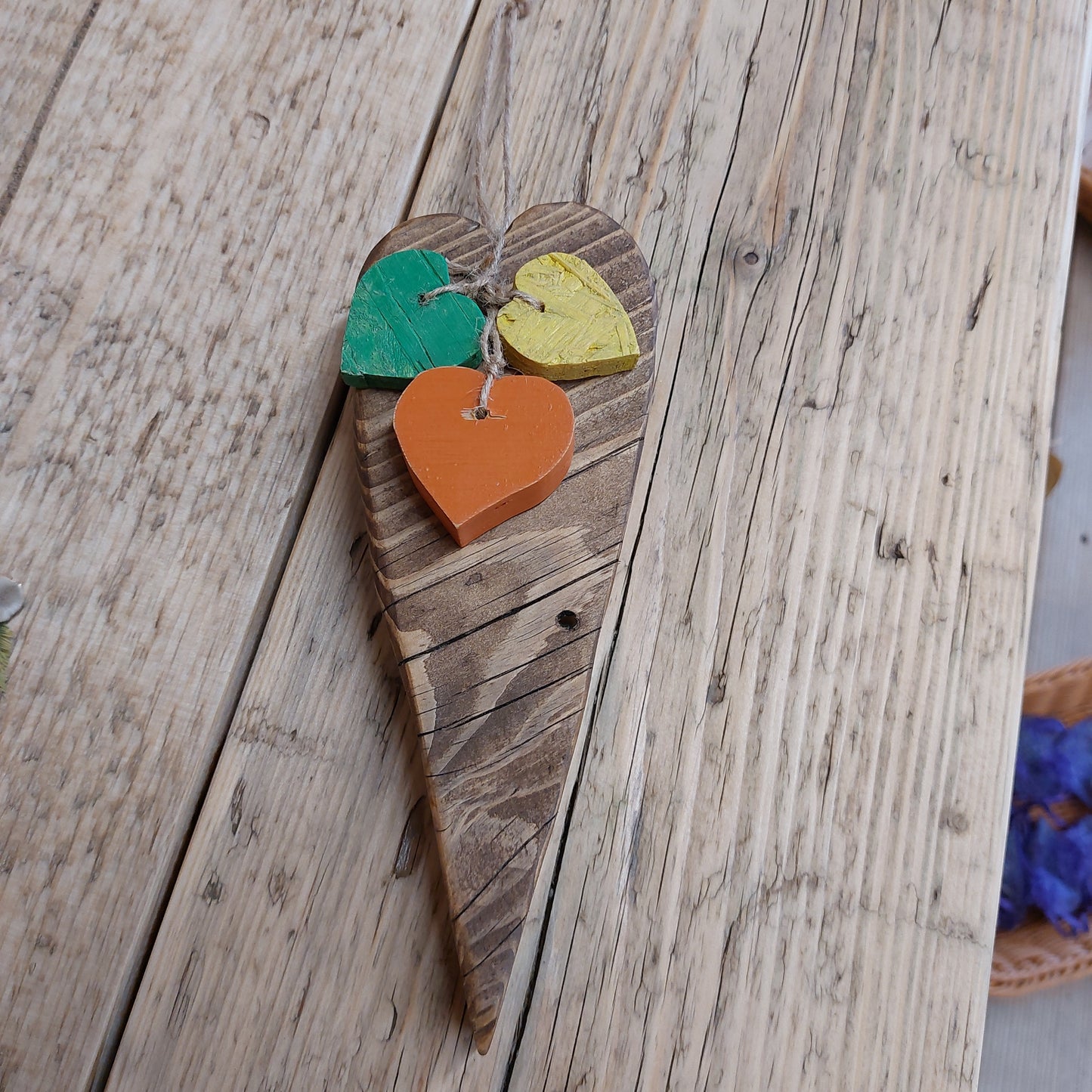 Chunky heart door hanger with 3 hearts in yellow green and orange solid wood