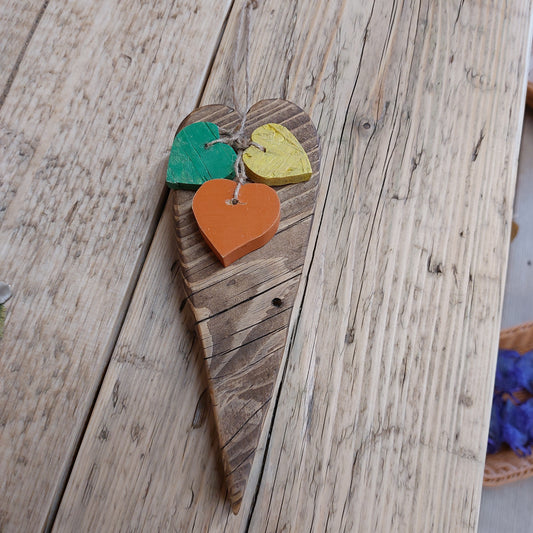 Chunky heart door hanger with 3 hearts in yellow green and orange solid wood