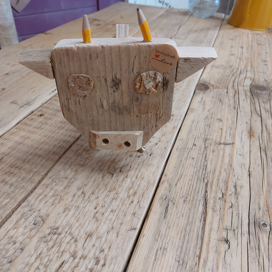 Handmade wooden cow