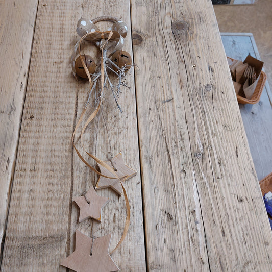 Handmade rustic door hanger with stars and bells