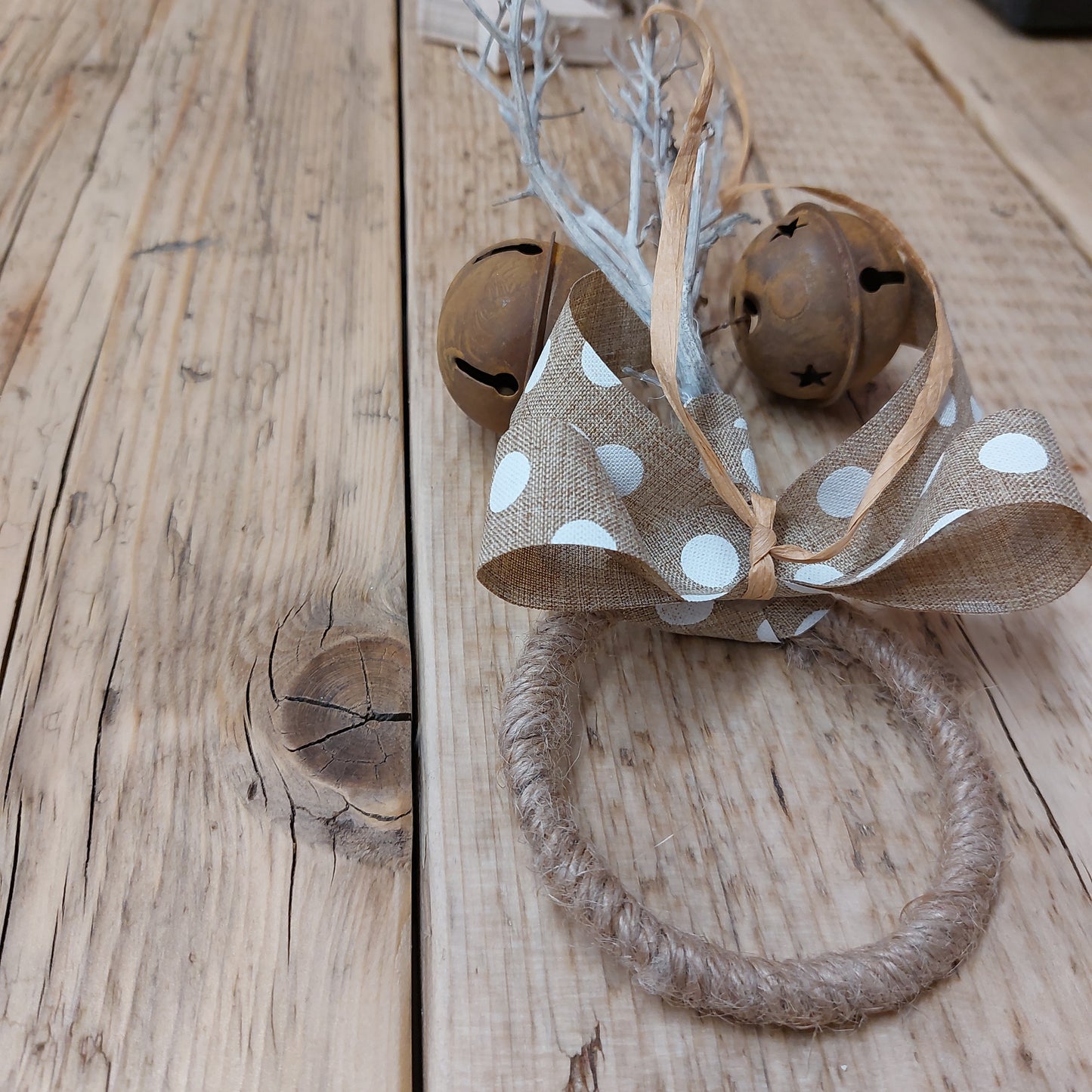 Handmade rustic door hanger with stars and bells
