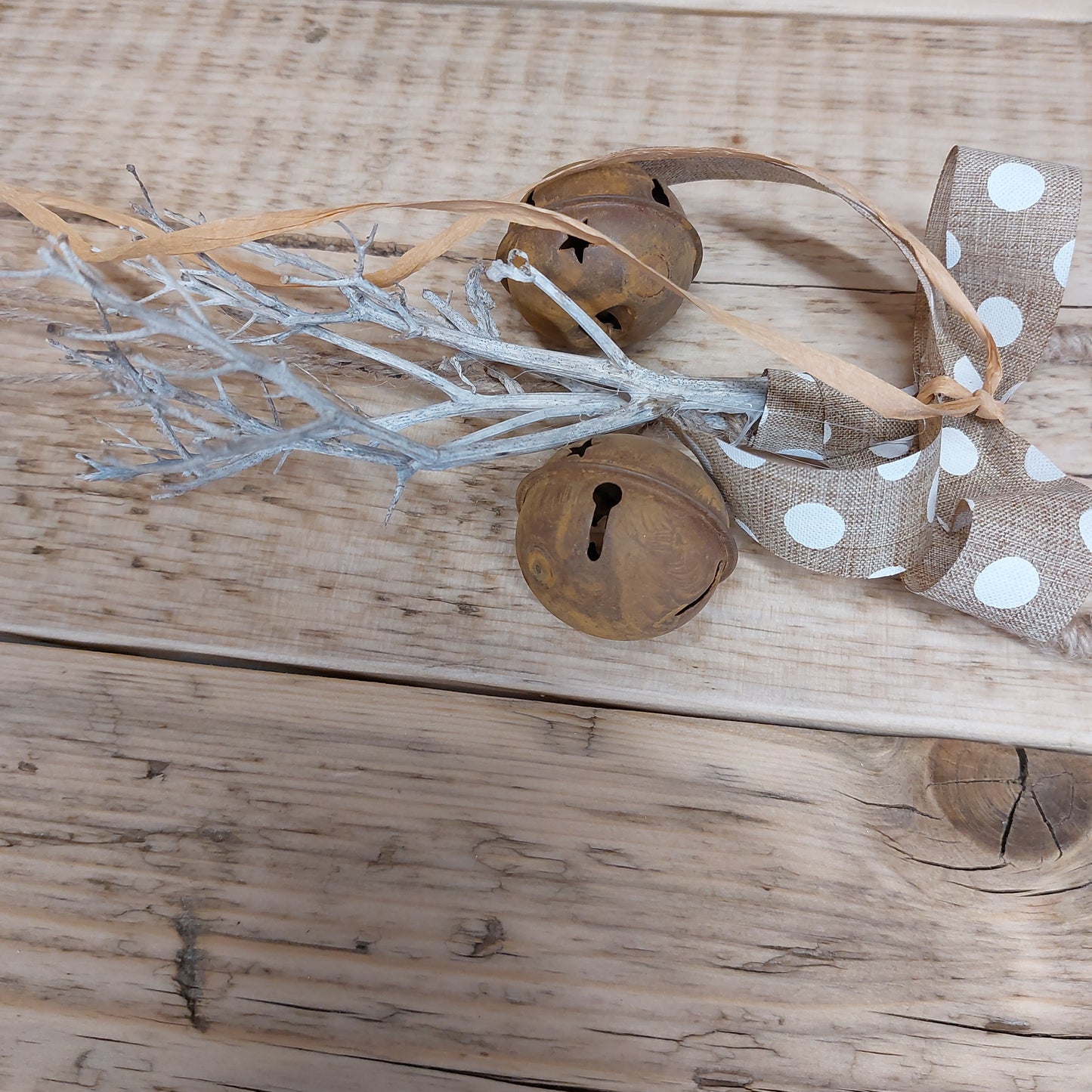 Handmade rustic door hanger with stars and bells